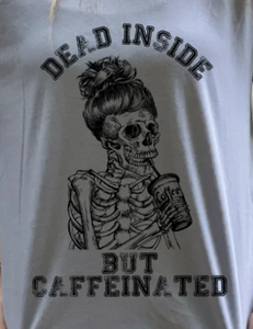 Shirt with skeleton drinking coffee graphic and "dead inside but caffeinated" quote