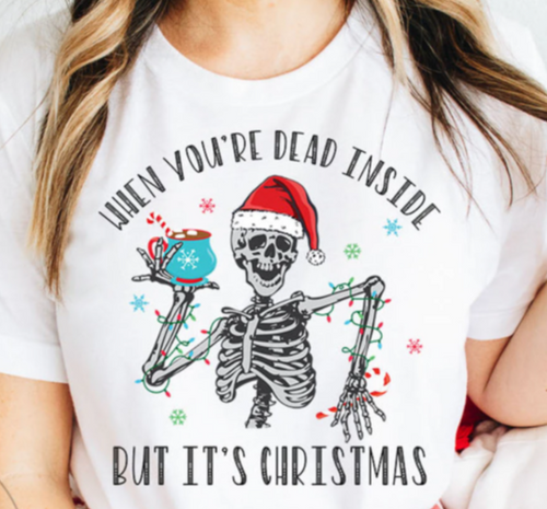 T-shirt with skeleton wearing santa hat and holding coffee mug with 